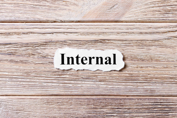 Internal of the word on paper. concept. Words of Internal on a wooden background - Photo, Image