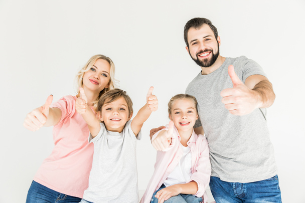 Famille heureuse avec pouce levé
 - Photo, image