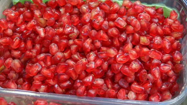 Peeled pomegranate berries - Photo, Image