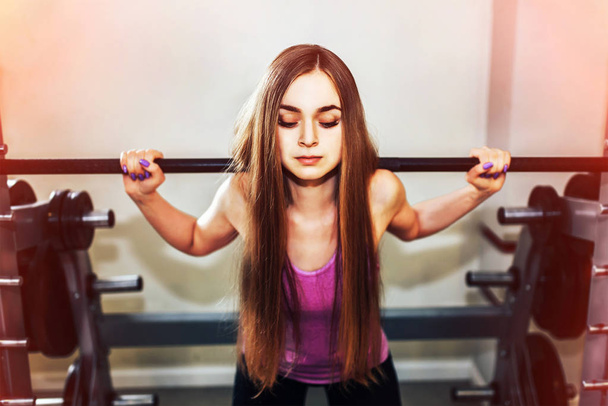 girl lifting weights - 写真・画像