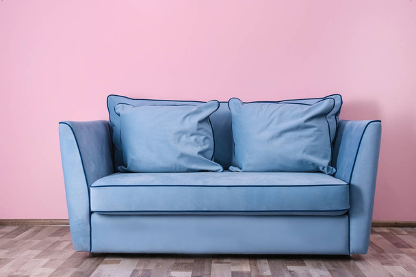Comfortable sofa with pillows  - Фото, изображение