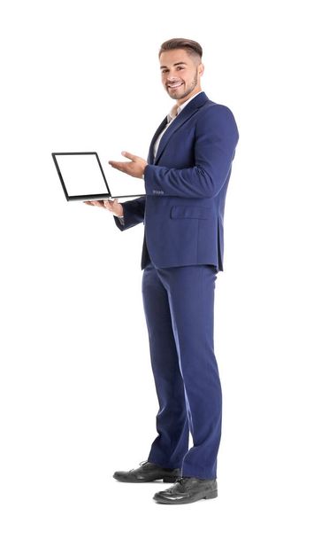 Young man with laptop - Фото, зображення