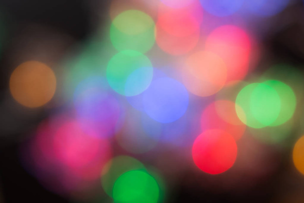 Christmas abstract. City night light blur bokeh, defocused background. - Foto, afbeelding