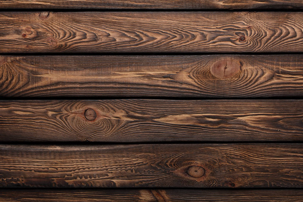 Texture of boards of dark old brown wood - 写真・画像