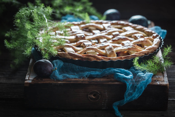 Rustic and homemade plum pie made of fresh ingredients - Фото, зображення