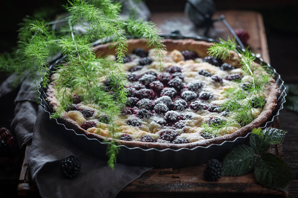 Homemade and rustic tart with blackberries made of fresh fruits - 写真・画像