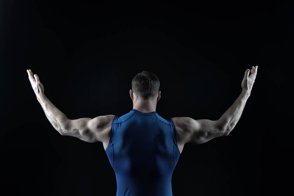 Man with muscular body and back. - Φωτογραφία, εικόνα