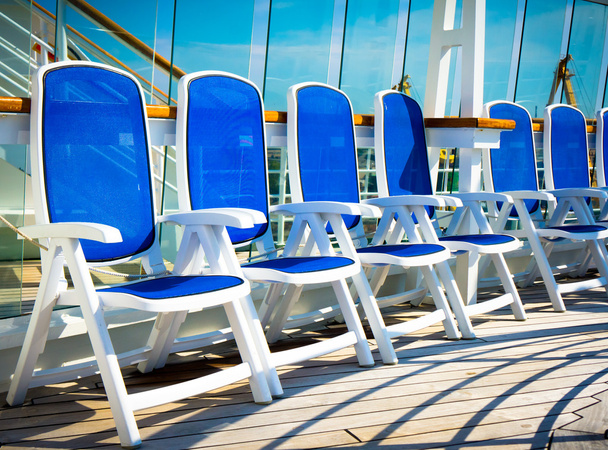 Close up view of blue deck chairs - Photo, Image