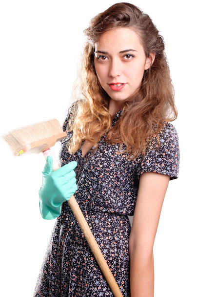 Young smiling housewife cleaner. Over white background - Photo, Image