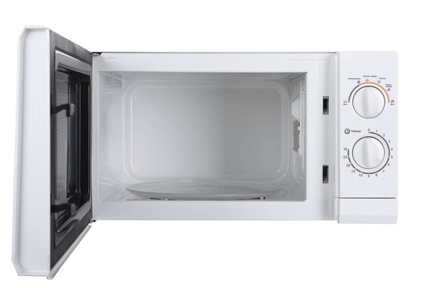 Novo forno de microondas branco isolado no fundo branco
 - Foto, Imagem