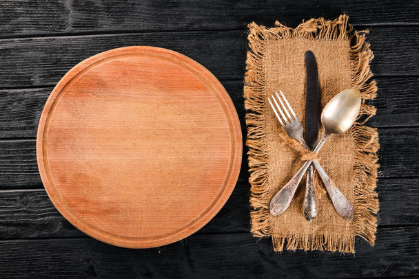 Cutlery. Vintage On a wooden background. Top view. Free space for text. - Foto, Imagen