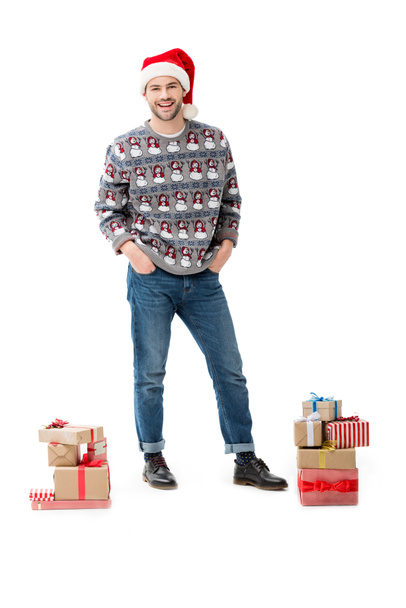 homem com pilhas de presentes de Natal
 - Foto, Imagem