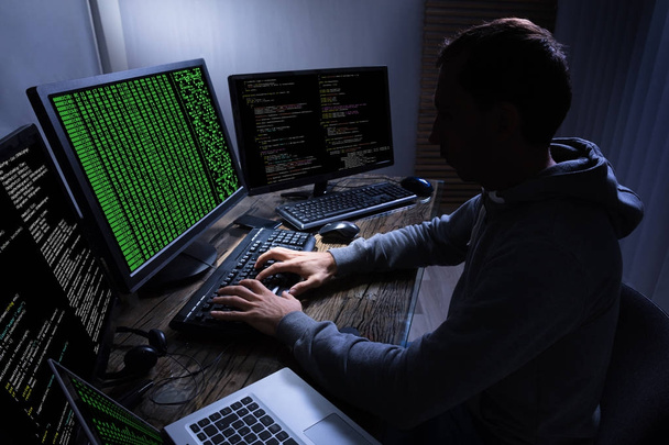 Hacker Stealing Information  - Foto, Bild