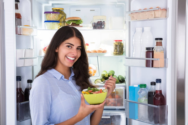 Happy Woman Eating Salad - Photo, image