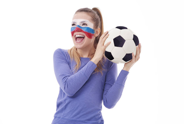 Female fan cheering on their favourite sports team - Foto, imagen