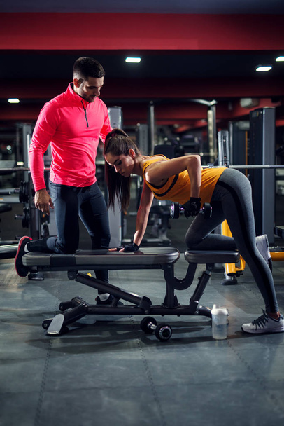 woman exercising with trainer  - Photo, image