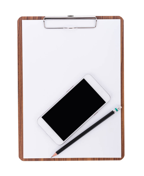téléphone et crayon sur papier blanc sur presse-papiers en bois avec espace o
 - Photo, image