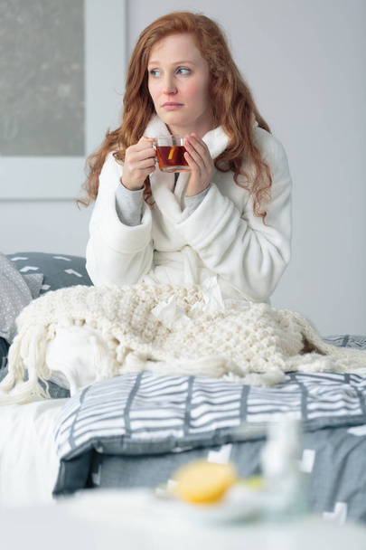 Woman with flu drinking mixture - Photo, Image
