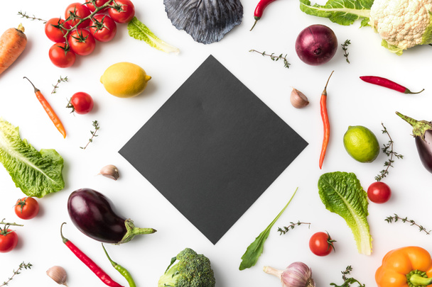 black board among uncooked vegetables - Photo, Image
