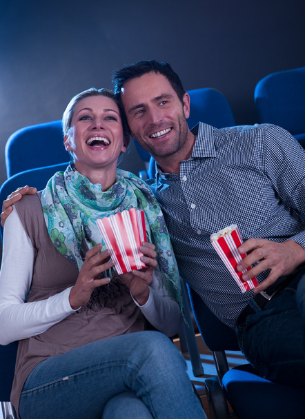 Stylish couple enjoying a movie - Фото, зображення