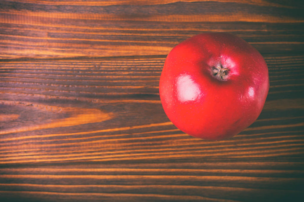 Apples on a wooden background. Organic fruits - Photo, Image