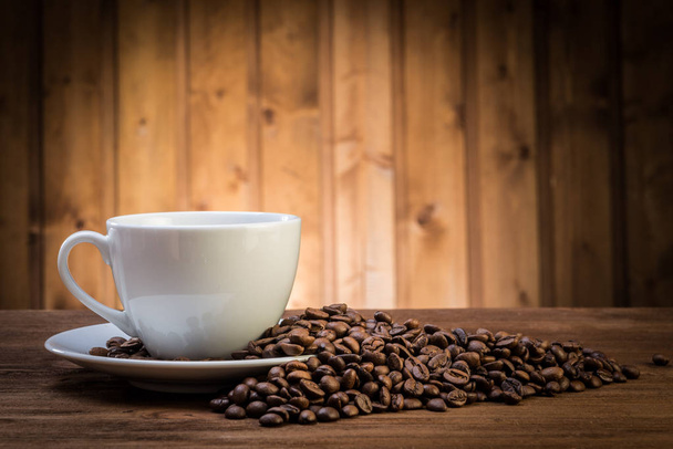 still life with coffee beans and old coffee mill on the wooden background  - Foto, immagini