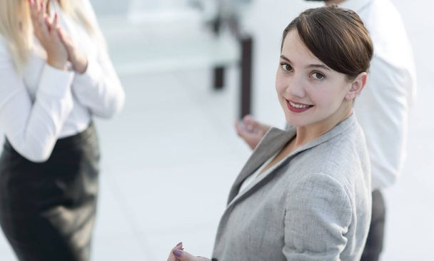 confident business woman on blurred background office. - Fotó, kép