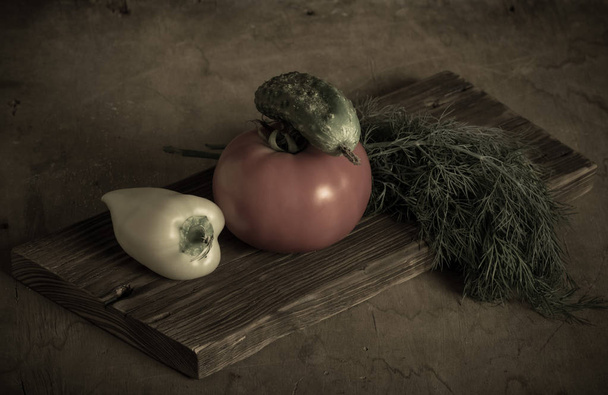 Fresh vegetables on a wooden burned rustic texture for backgroun - Photo, Image