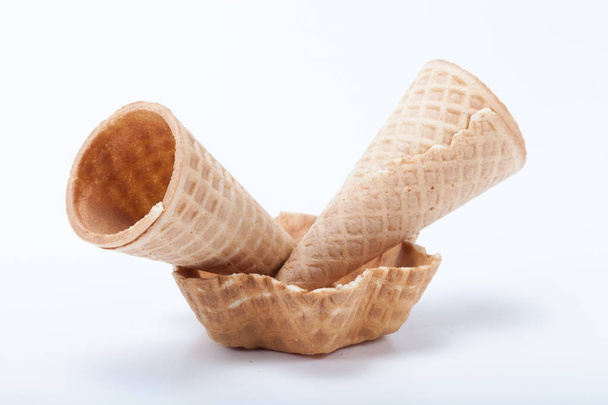 Empty sugar waffle cones for the ice cream isolated on white bac - Photo, Image