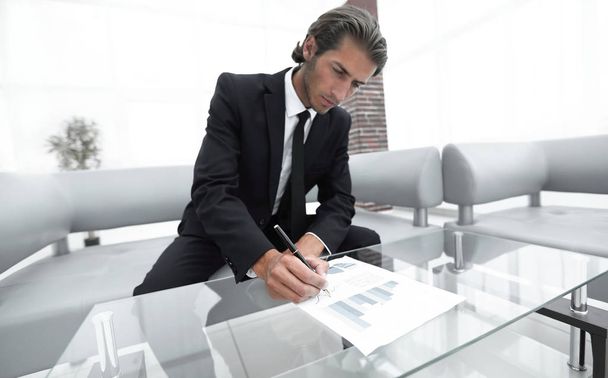 businessman working with a financial report. - Photo, Image