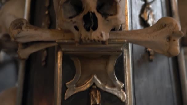 KUTNA HORA, CZECH REPUBLIC - JULY, 2015: Interior of Ossuary, Kostnice, Czech Republic, Kutna Hora. Human skeletons, skulls and bones. - Felvétel, videó