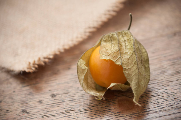  physalis on wooden table background - Foto, immagini