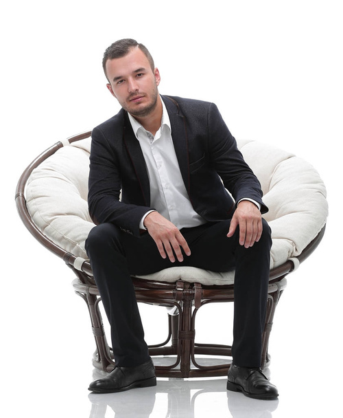 young businessman sitting in a comfortable chair - Foto, Bild