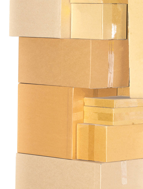 Stacks of cardboard boxes isolated on white background - Photo, Image