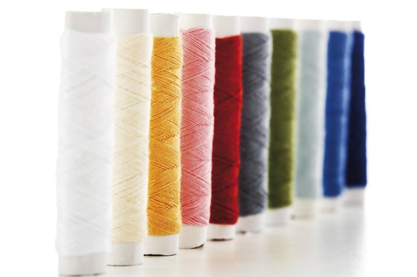 different coloured spools of threads - Fotografie, Obrázek