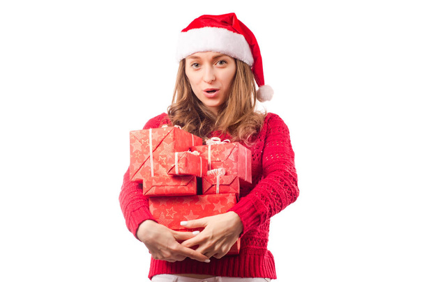 Young beautiful woman in hands holding a new year christmas holiday gift - Foto, afbeelding
