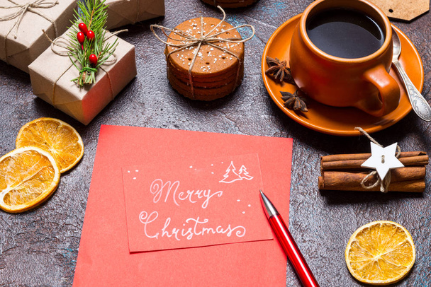 Christmas holidays composition on brown background with Merry Christmas - 写真・画像