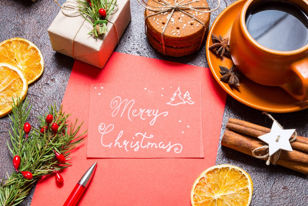 Christmas holidays composition on brown background with Merry Christmas - 写真・画像