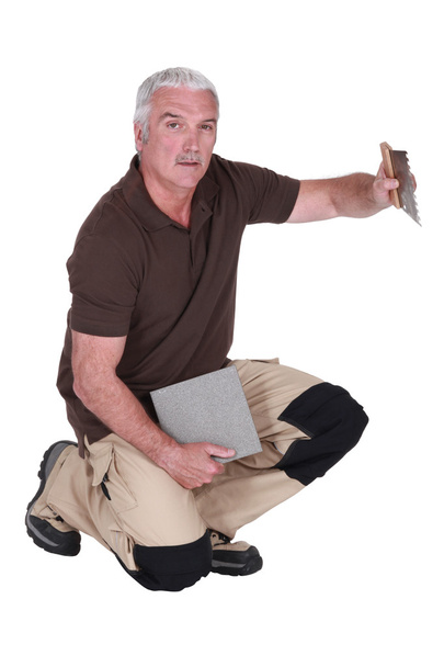 Senior tiler working - Fotografie, Obrázek