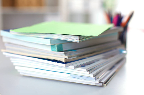close up of stack of papers on white background - Photo, Image