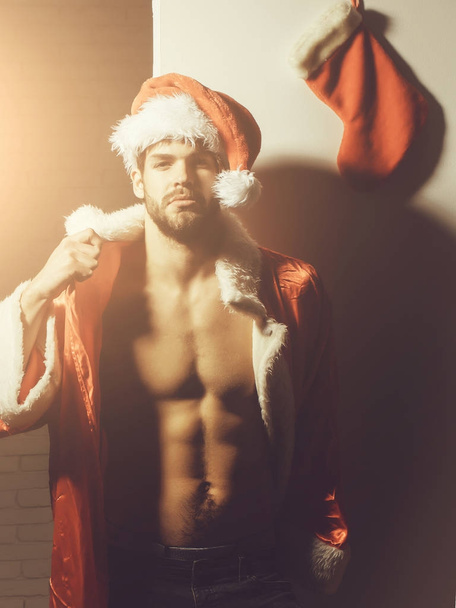 handsome sexy santa man - Foto, afbeelding