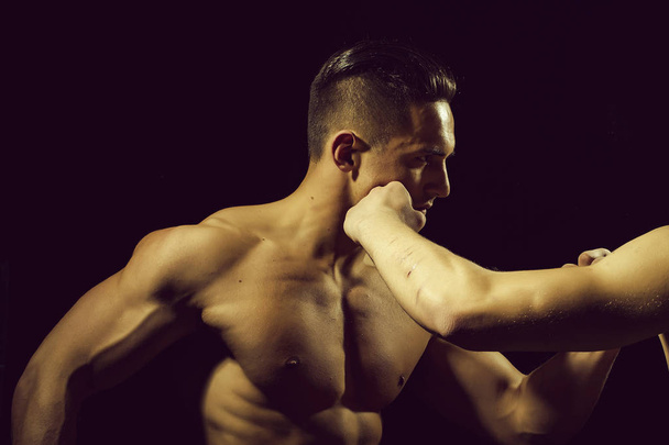 Young muscular men boxing - Foto, Imagen