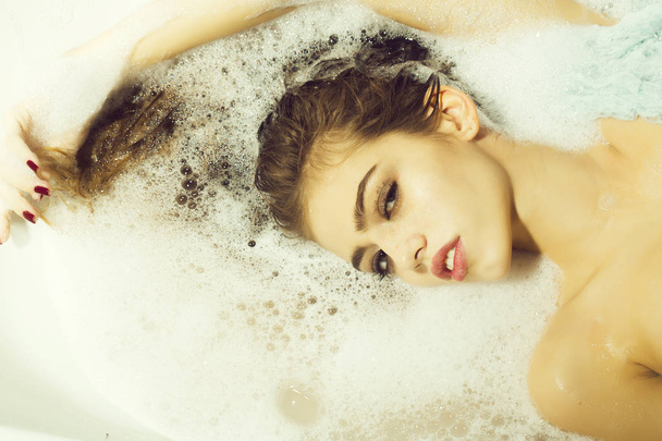 Flirtatious woman in bath - Фото, зображення