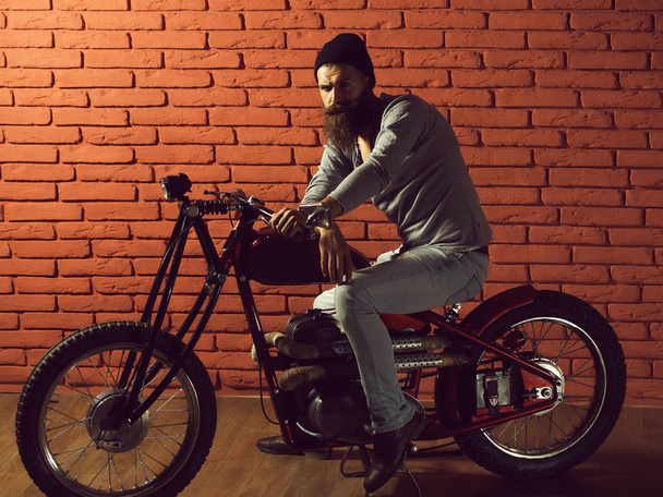 bearded biker man on motorbike - Photo, image