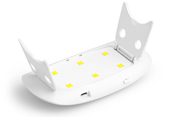 УФ лампи для цвяхів на білому тлі
 - Фото, зображення