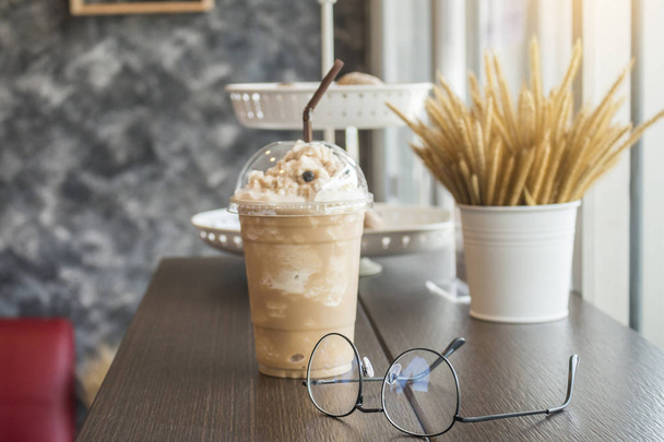 Ice coffee with eye glass  - Zdjęcie, obraz