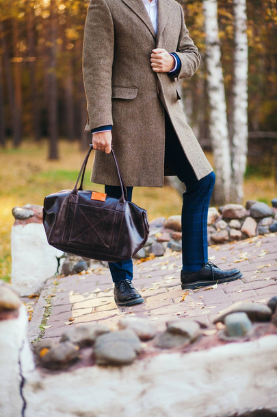 Busy man walking on street with briefcase - Фото, зображення