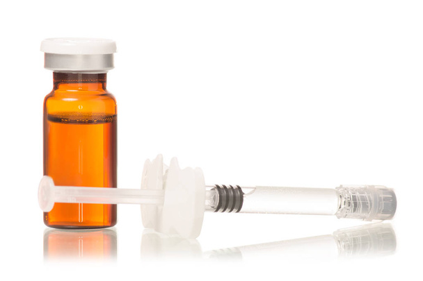 Medicina de vidro frasco botox ou gripe com seringa médica
 - Foto, Imagem