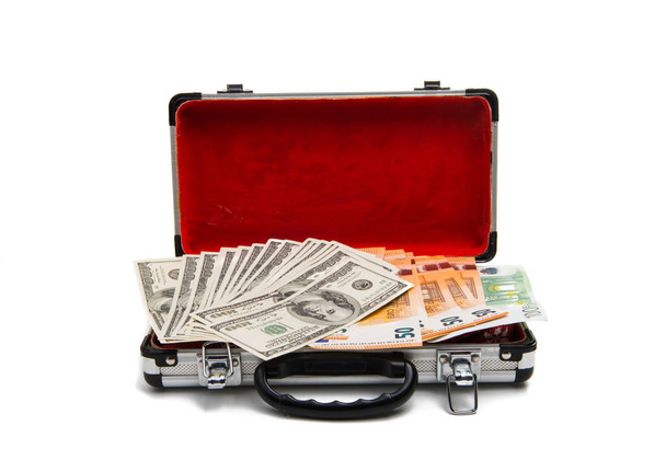 euro dollars in an aluminum case isolated - Foto, imagen