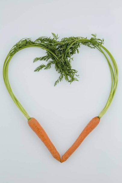 fresh carrots in heart shape - Photo, Image